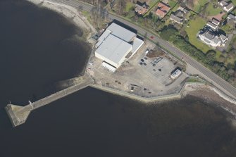 Oblique aerial view of former seaplane base, looking NNW.