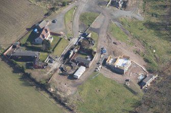 Oblique aerial view of the 6-inch gun emplacements and Battery Observation and Fire Control Posts, looking E.