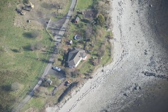 Oblique aerial view of the W searchlight position, now incorporated into a current house, looking NE.