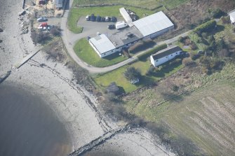 Oblique aerial view of the pillbox and RA store, looking W.