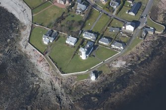 Oblique aerial view of Toward Point lighthouse, looking to the NW.