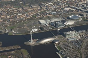 Oblique aerial view of The Hydro, Scottish Exhibition Centre and Glasgow Science Centre, looking to the NE.