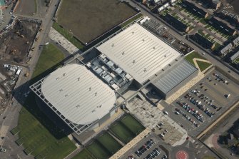 Oblique aerial view of of the Sir Chris Hoy Velodrome, looking to the E.