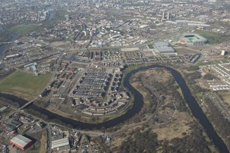 Oblique aerial view of of the Glasgow Commonwealth Games site, looking to the WNW.