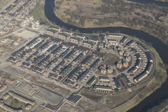 Oblique aerial view of of the Glasgow Commonwealth Games site including the athlete's village, looking to the N.