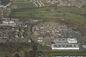 Oblique aerial view of of Stobhill General Hospital, looking to the N.