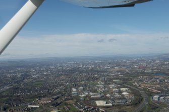 General oblique aerial view of Glasgow with Shettleston in the foreground, looking W.