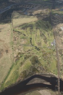 Oblique aerial view of Bogside Golf Course, looking NW.