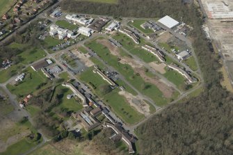 Oblique aerial view of Ayrshire Central Hospital, looking NW.