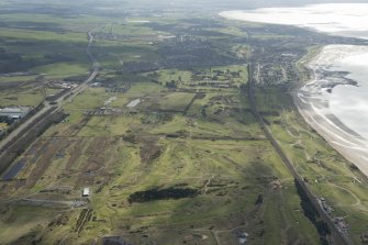 Oblique aerial view of Dundonald Links Golf Course, Kilmarnock Barassie Golf Course and Western Gailes Golf Course, looking S.
