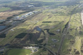 Oblique aerial view of Dundonald Links Golf Course, Kilmarnock Barassie Golf Course and Western Gailes Golf Course, looking SSE.