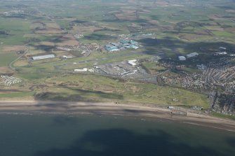 Oblique aerial view of Prestwick Golf Course and Prestwick Airport, looking NE.