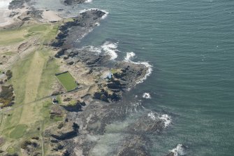 Oblique aerial view of Turnberry Castle and Turnberry Lighthouse, looking SW.