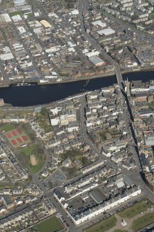 Oblique aerial view of Ayr New Bridge, St John The Baptist Church and Ayr Academy, looking NE.