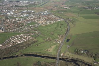 Oblique aerial view of Ayr Airfield and Ayr Racecourse, looking NNW.