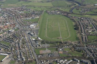 Oblique aerial view of Ayr Airfield and Ayr Racecourse, looking WSW.