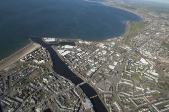 Oblique aerial view of Ayr and main harbour, looking NW.
