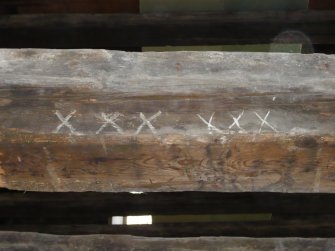 Chalk markings on centre of beam, looking east