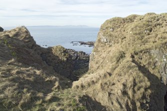 View from south of outer sea gate and walls of building.