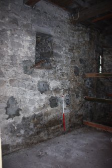 Internal ground floor, Room 3, general view of W wall