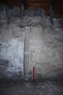 Internal upper floor, Room 4, General view of the S wall showing chimney brickwork