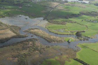 Oblique aerial view showing the flooding along the River Dee at Threave Castle, looking ESE.
