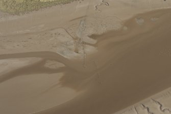 Oblique aerial view of the Scaur Fishery stake nets, looking ENE.