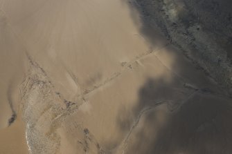 Oblique aerial view of the Upper Kirkbride Fishery stake nets, looking N.