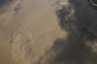 Oblique aerial view of the Upper Kirkbride Fishery stake nets, looking N.