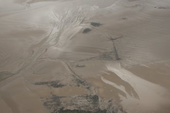 Oblique aerial view of the Powfoot stake nets, looking SW.