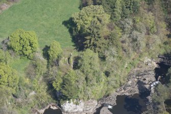 Oblique aerial view of Corra Castle, looking N.