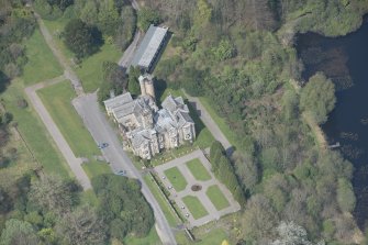 Oblique aerial view of Auchen Castle Country House, looking NNW.