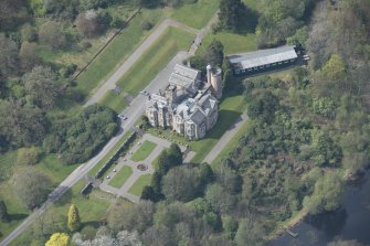 Oblique aerial view of Auchen Castle Country House, looking WNW.