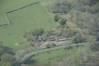 Oblique aerial view of Lochhouse Tower, looking W.