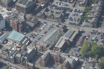 Oblique aerial view of Loreburn Hall Drill Hall, looking NW.