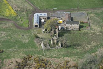 Oblique aerial view of Brunston Castle and Brunston Farm, looking NNW.