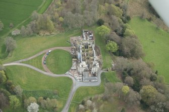 Oblique aerial view of Penicuik House, looking SE.