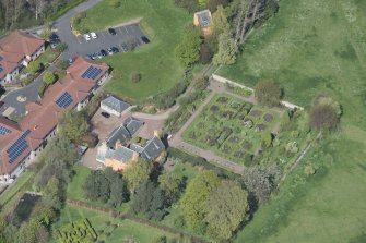 Oblique aerial view of Liberton House and walled garden, looking NNE.