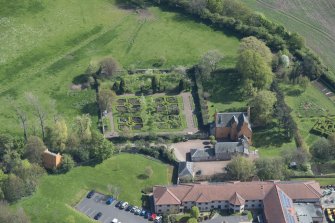 Oblique aerial view of Liberton House, walled garden and dovecot, looking SE.