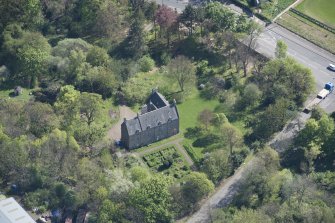 Oblique aerial view of Peffermill House, looking SSE.