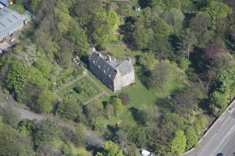 Oblique aerial view of Peffermill House, looking E.