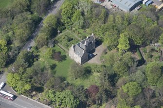 Oblique aerial view of Peffermill House, looking N.