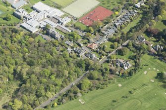 Oblique aerial view of Old Ravelston House, Ravelston House walled garden and the Mary Erskine School, looking ESE.