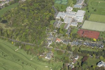 Oblique aerial view of Old Ravelston House, Ravelston House walled garden and the Mary Erskine School, looking NE.