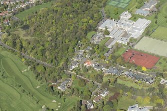 Oblique aerial view of Old Ravelston House, Ravelston House walled garden and the Mary Erskine School, looking NNE.
