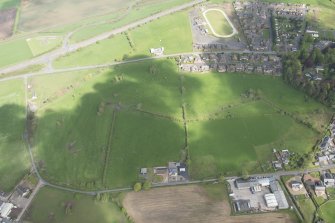 Oblique aerial view of Gretna Golf Course, looking N.