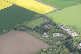 Oblique aerial view of East Fortune Airfield recreation area and Gilmerton House, looking SW.