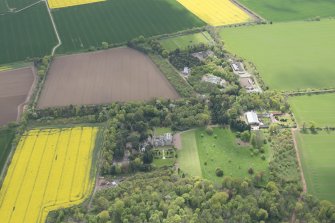 Oblique aerial view of East Fortune Airfield recreation area and Gilmerton House, looking S.