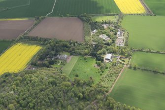 Oblique aerial view of East Fortune Airfield recreation area and Gilmerton House, looking SSE.