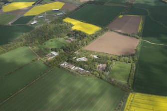 Oblique aerial view of East Fortune Airfield recreation area and Gilmerton House, looking NE.